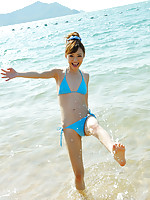 Aino Kishi Asian in blue bath suit is a true beauty enjoying sand