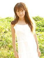 Nozomi Kawasaki Asian in yellow bath suit enjoys the sun and sea